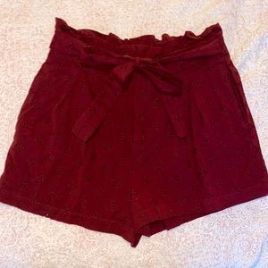 High waisted maroon shorts